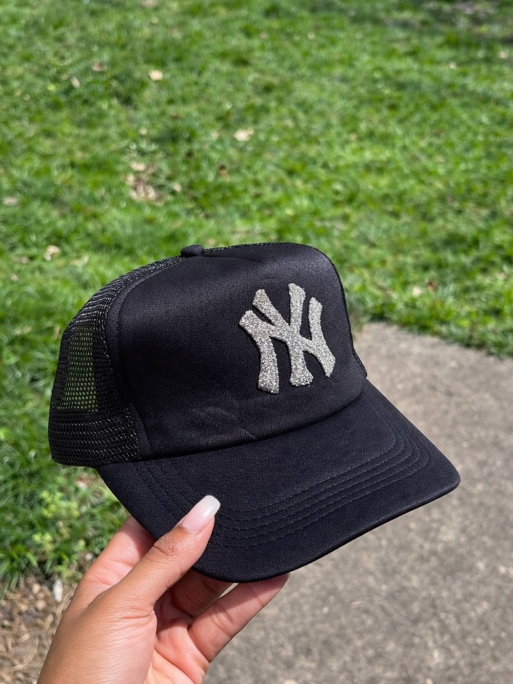 Black New York Yankee Trucker Cap with Silver Logo